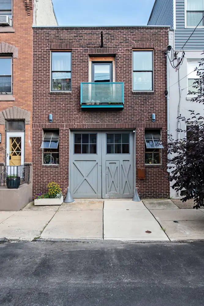 Brick carriage-house façade