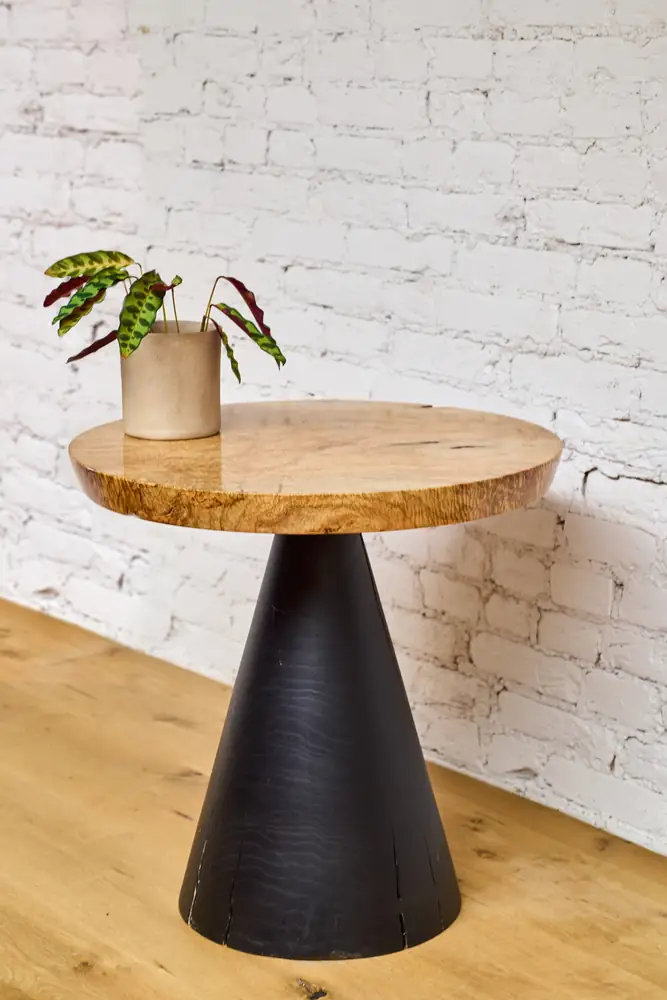 Cone side table with a spalted wood top on a blackened cone base